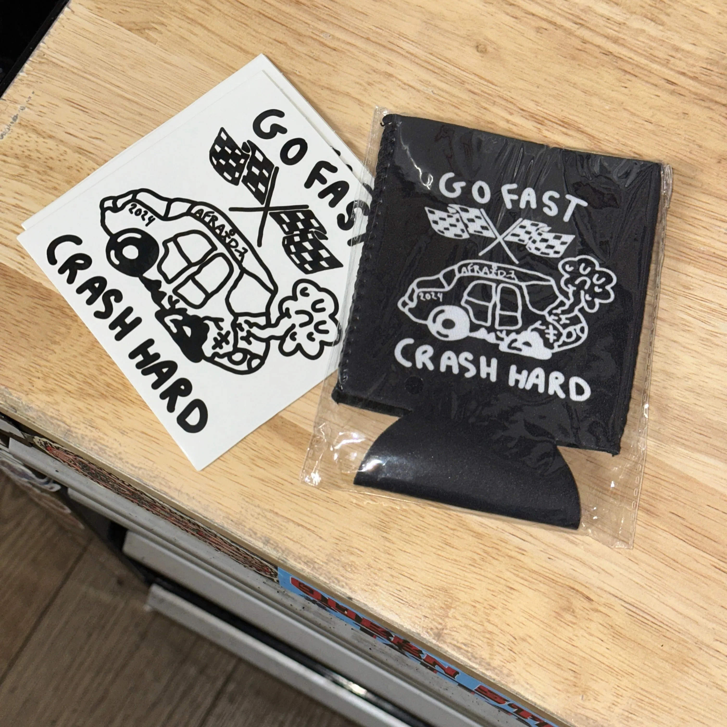 GO FAST . CRASH HARD STICKER