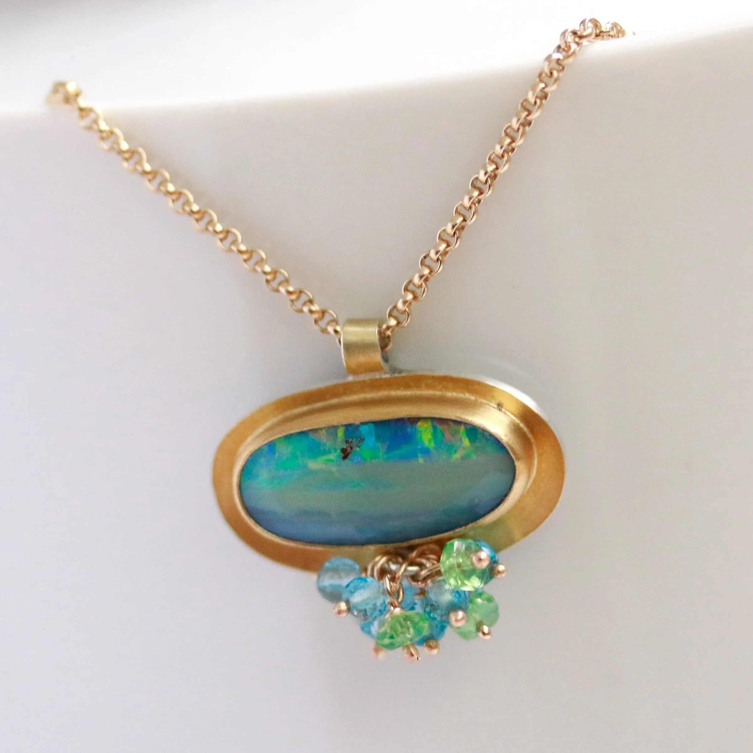 Sold! Green Blue Boulder Opal Pendant with Blue Topaz and Tsavorite Garnet Fringe