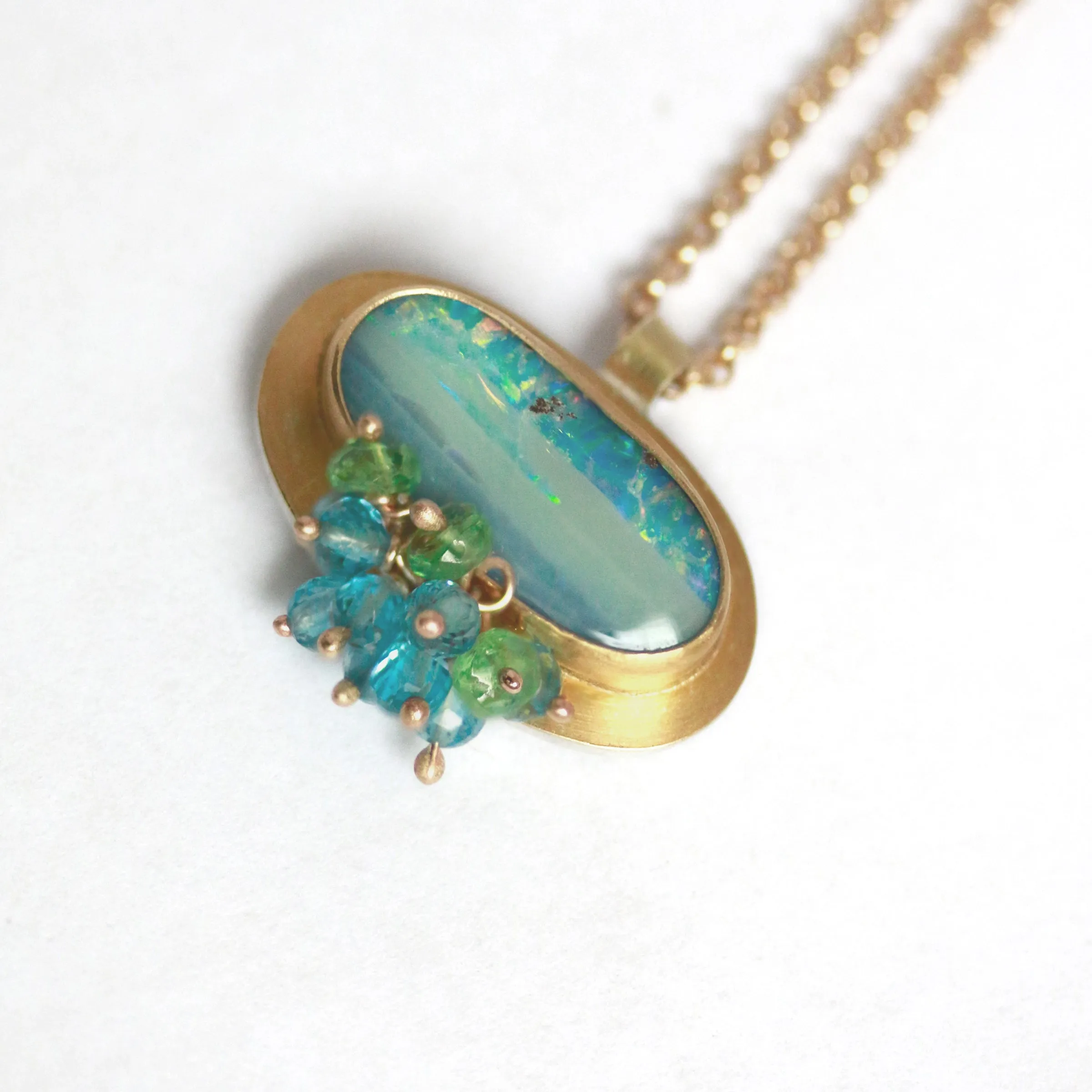 Sold! Green Blue Boulder Opal Pendant with Blue Topaz and Tsavorite Garnet Fringe