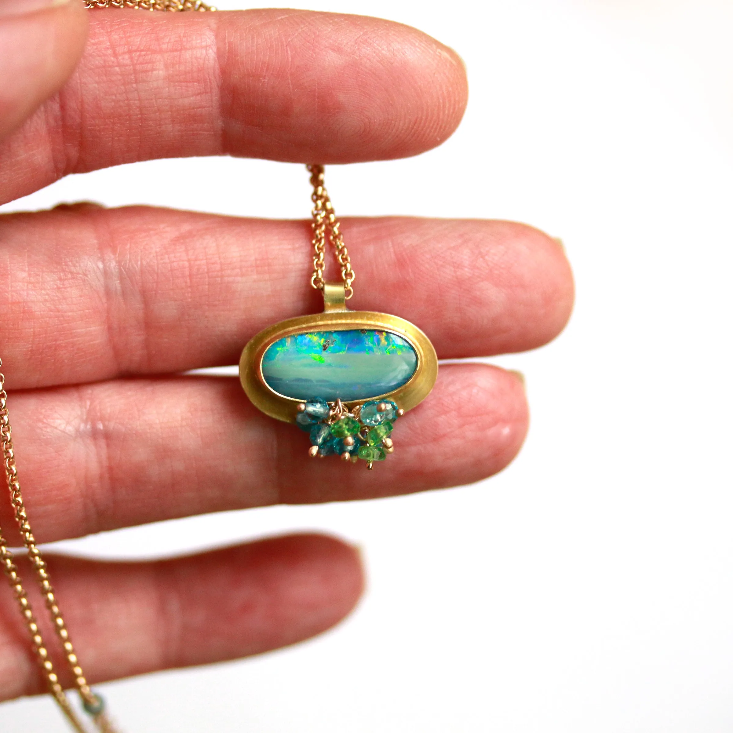 Sold! Green Blue Boulder Opal Pendant with Blue Topaz and Tsavorite Garnet Fringe