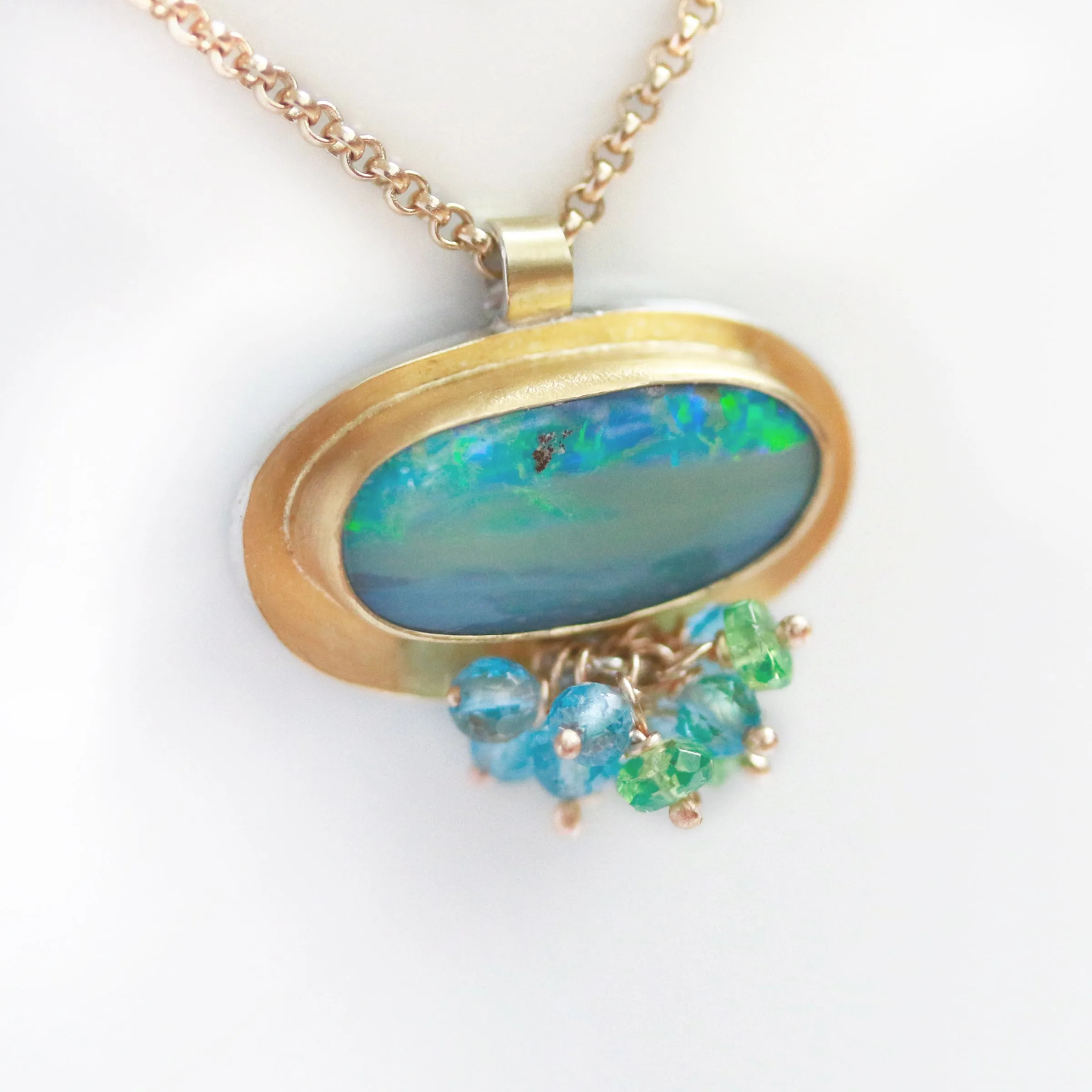 Sold! Green Blue Boulder Opal Pendant with Blue Topaz and Tsavorite Garnet Fringe