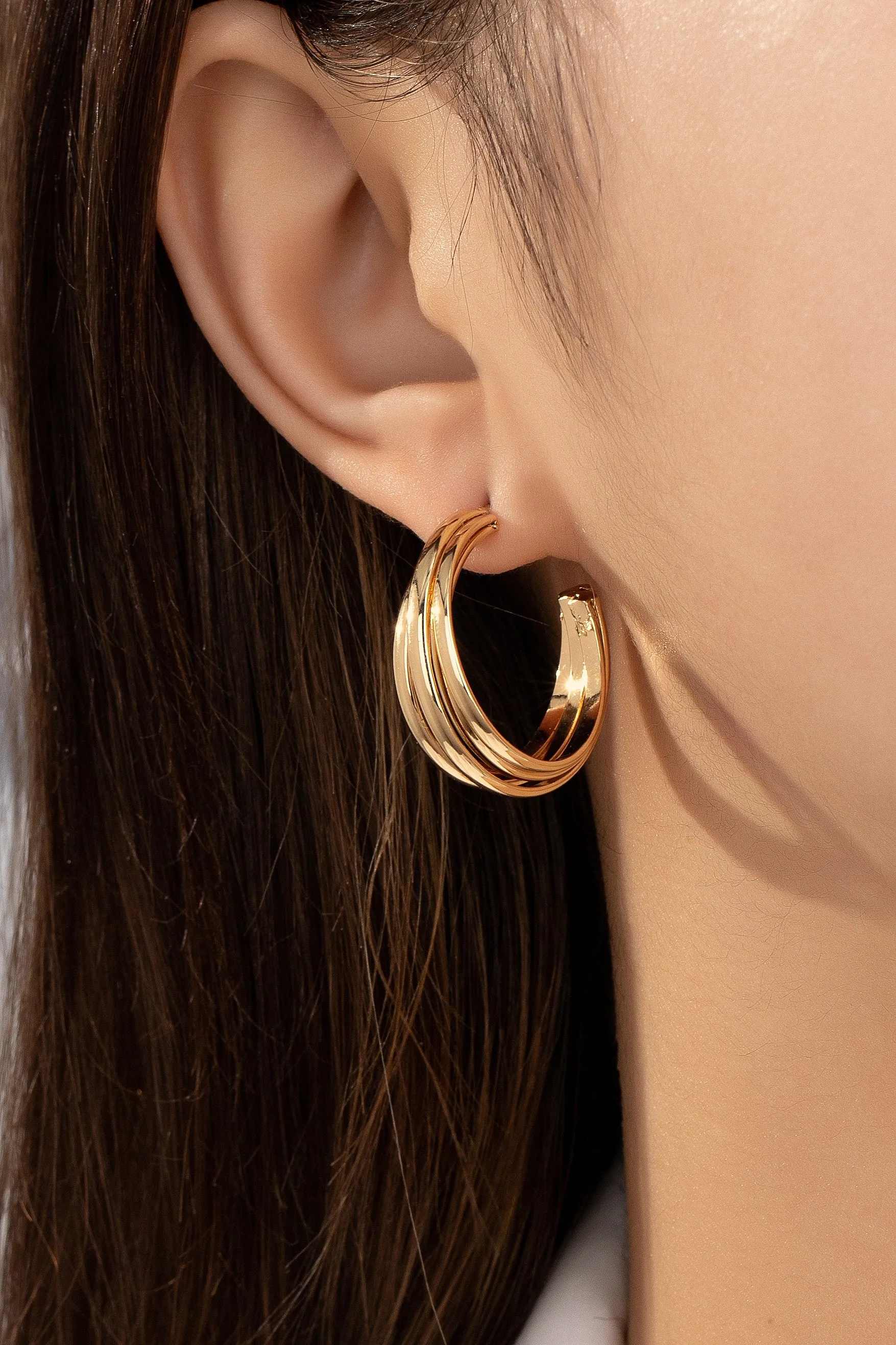 Triple Twist Interlock Hoop Earrings